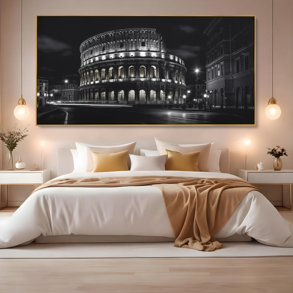 Tablou canvas cu tablou canvas cu colosseumul noaptea, in rama de aluminiu auriu, pe perete intr-un dormitor